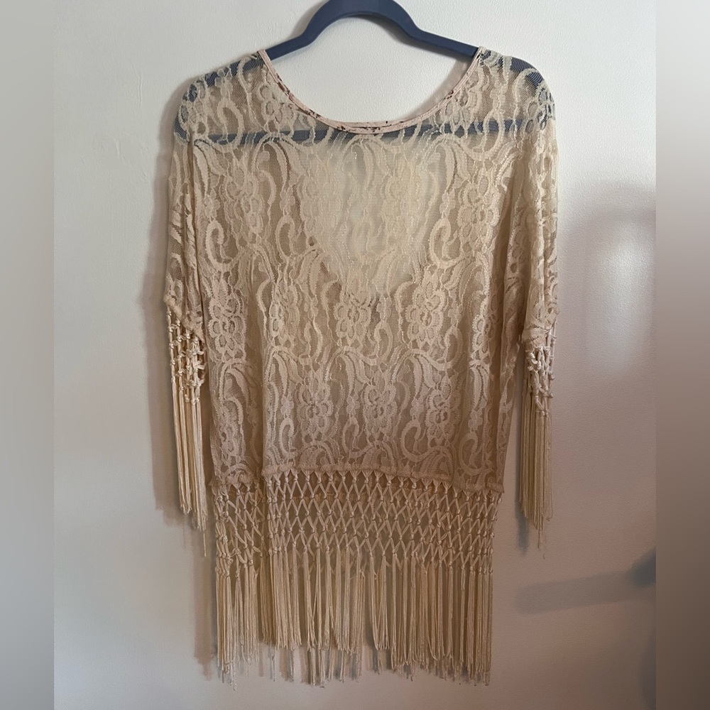 Perfect condition, like new! Lace top with fringe detail